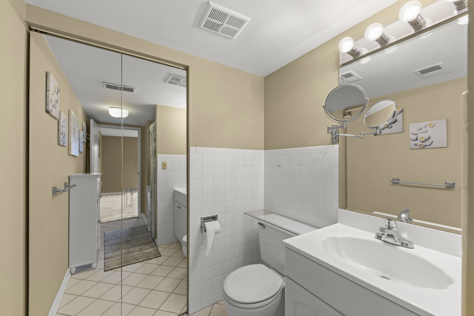 500 Redondo Drive, Unit 409 Downers Grove, IL 60516 - Photo 14 of 18 a bathroom with a sink a toilet and shower