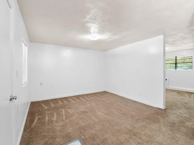 an empty room with windows