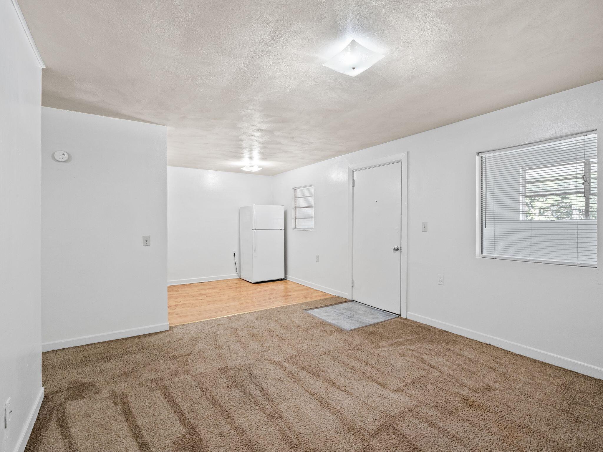 100 Ridgeview Lane, Unit 25 Bassett, VA 24055 - Photo 4 of 23 a view of an empty room with a chandelier fan