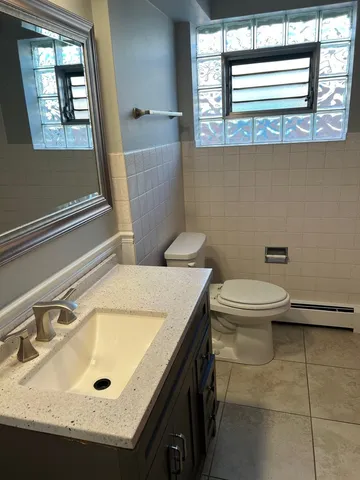 a bathroom with a sink and a toilet