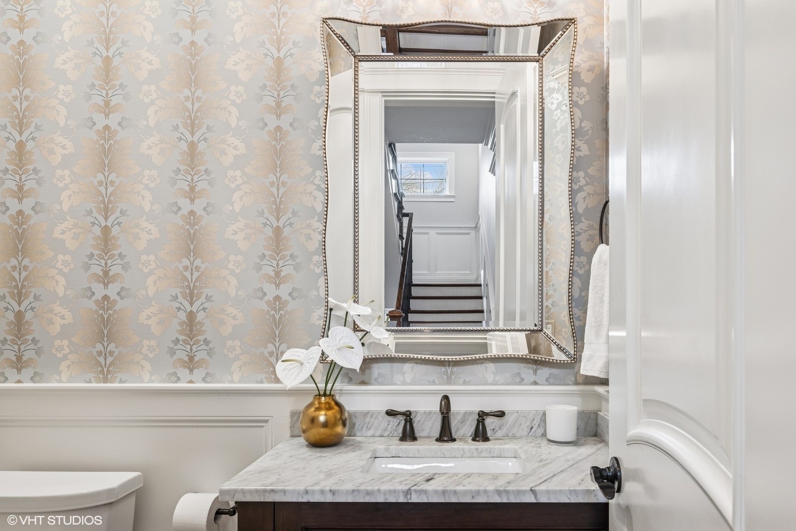 218 10th Street Wilmette, IL 60091 - Photo 14 of 45 a bathroom with a granite countertop sink and a mirror