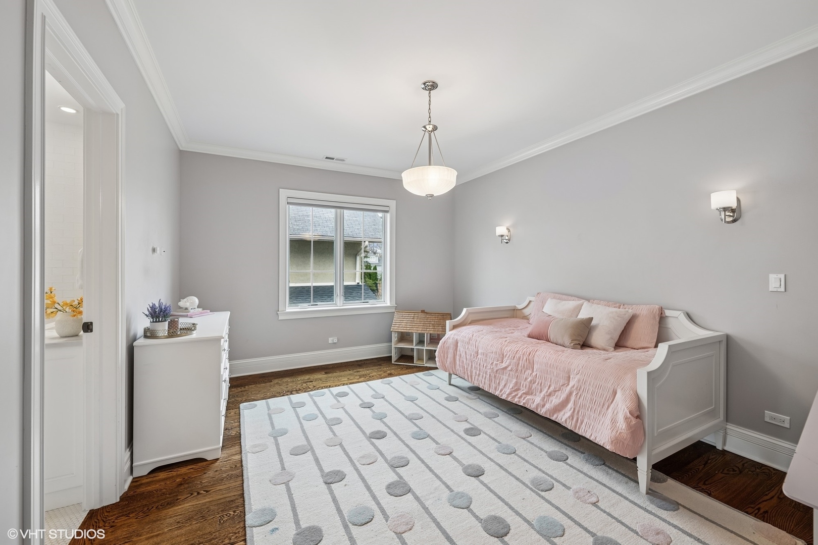 218 10th Street Wilmette, IL 60091 - Photo 23 of 45 a bedroom with a bed and a window