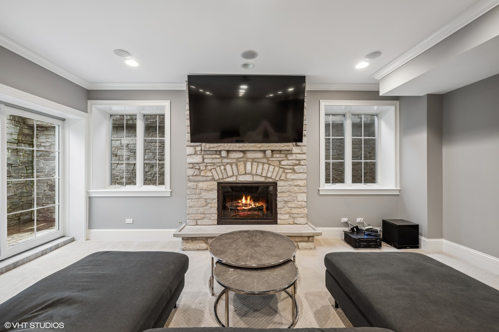 218 10th Street Wilmette, IL 60091 - Photo 29 of 45 a living room with furniture and a fireplace