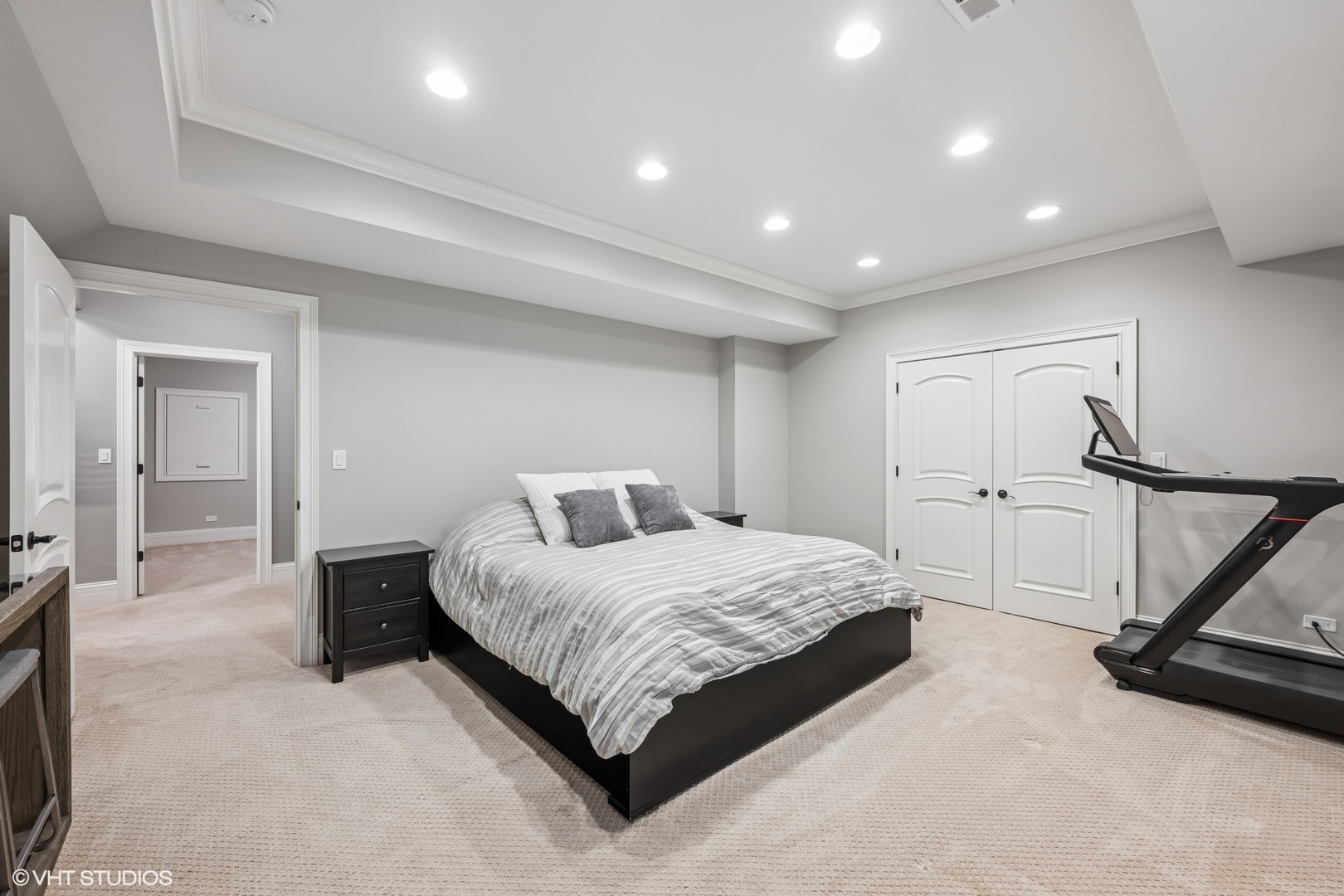 218 10th Street Wilmette, IL 60091 - Photo 35 of 45 a spacious bedroom with a bed and a dresser