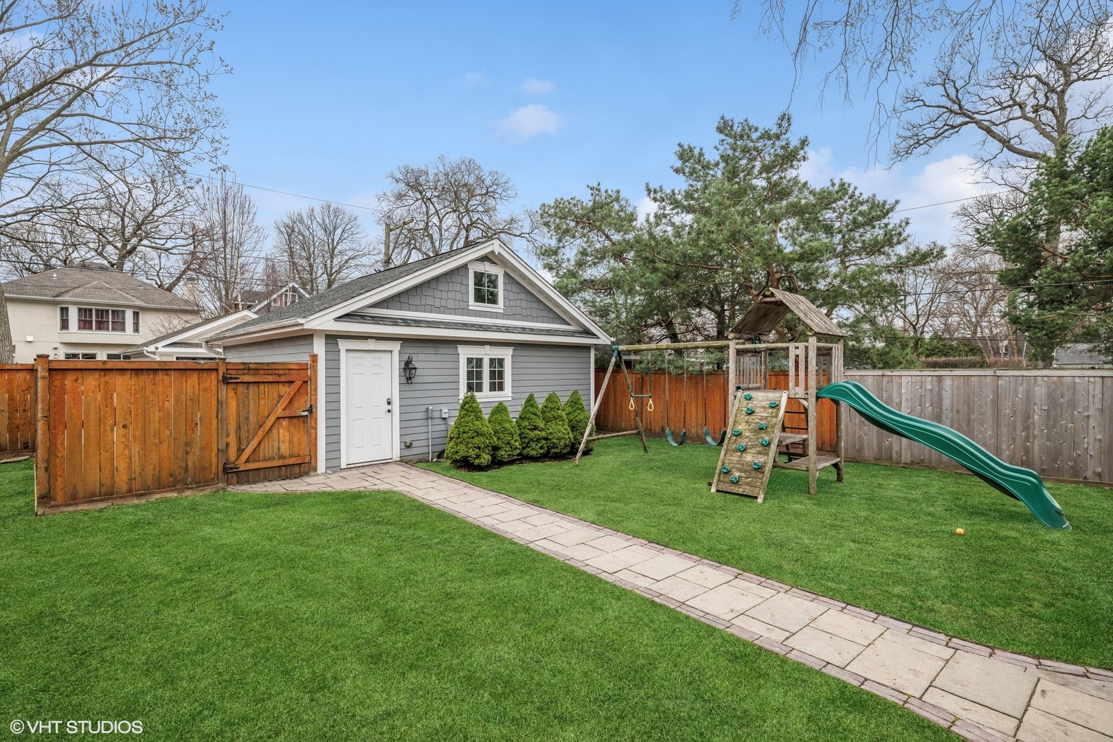 218 10th Street Wilmette, IL 60091 - Photo 40 of 45 a front view of a house with a yard and trees