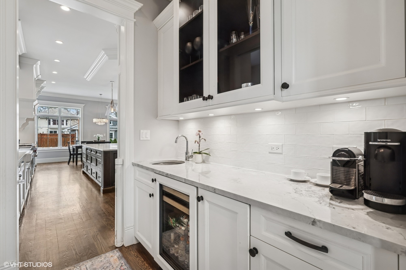 218 10th Street Wilmette, IL 60091 - Photo 6 of 45 a kitchen with a sink and a stove top oven