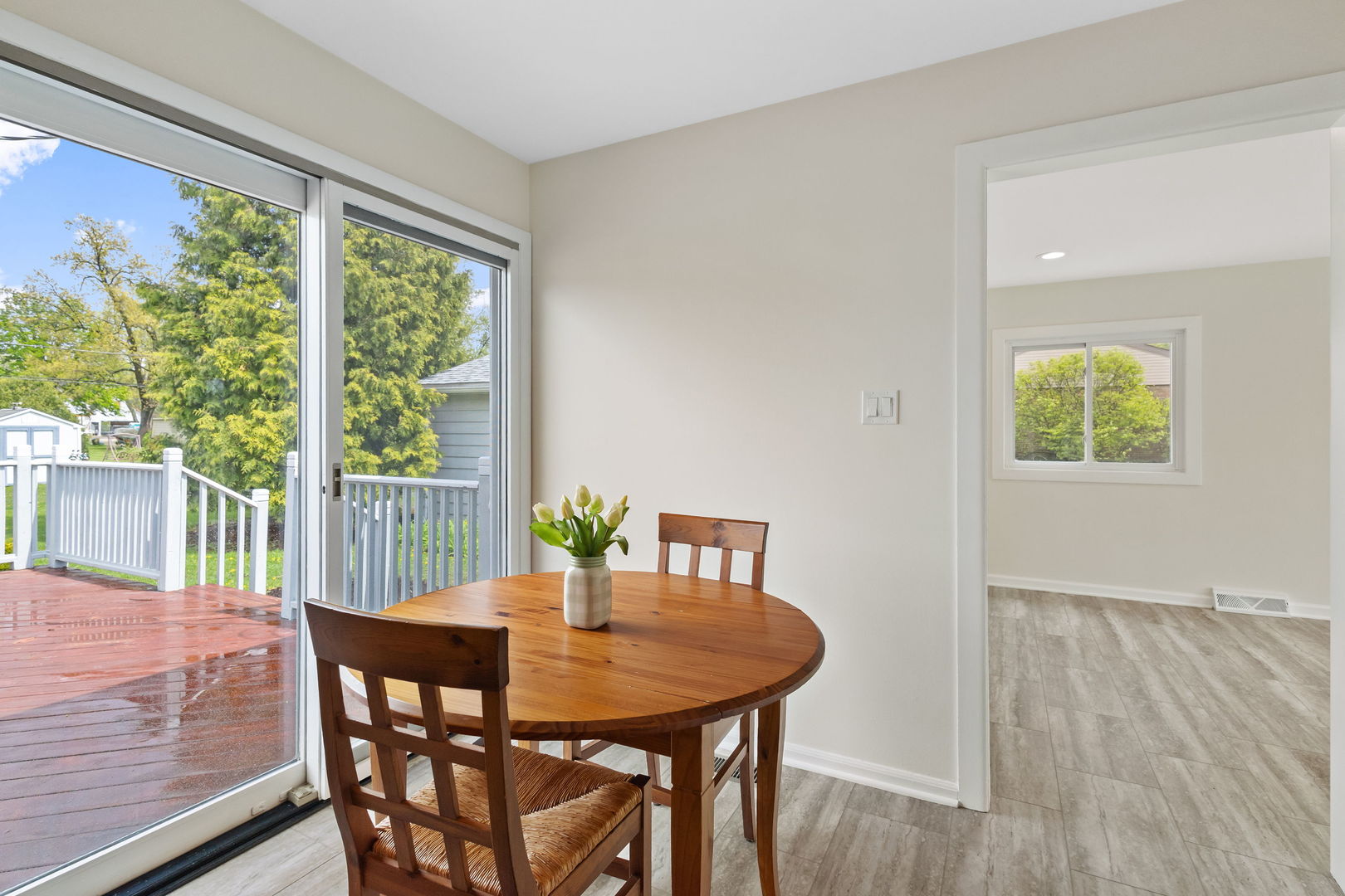 646 68th Street Willowbrook, IL 60527 - Photo 9 of 24 a view of a dining room with furniture and a window