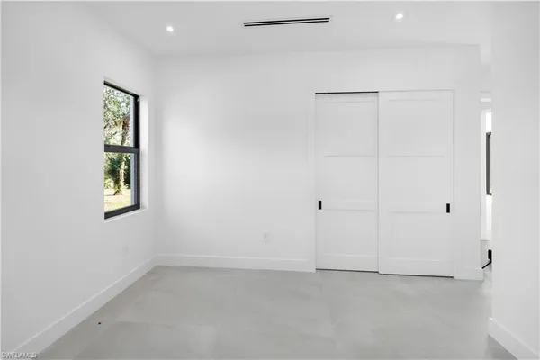 an empty room with window