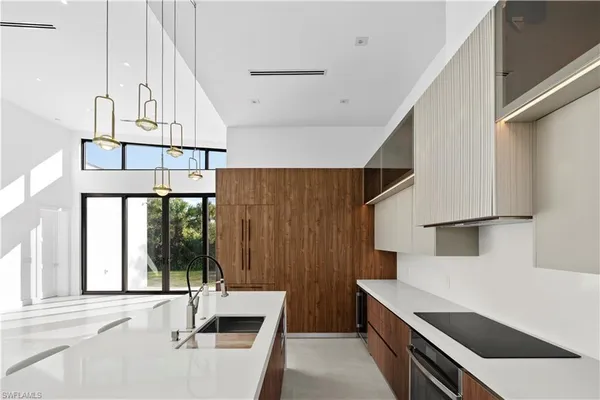 a view of a kitchen with furniture and window
