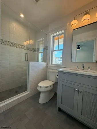 a bathroom with a sink and toilet