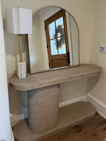 a bathroom with a mirror and a toilet