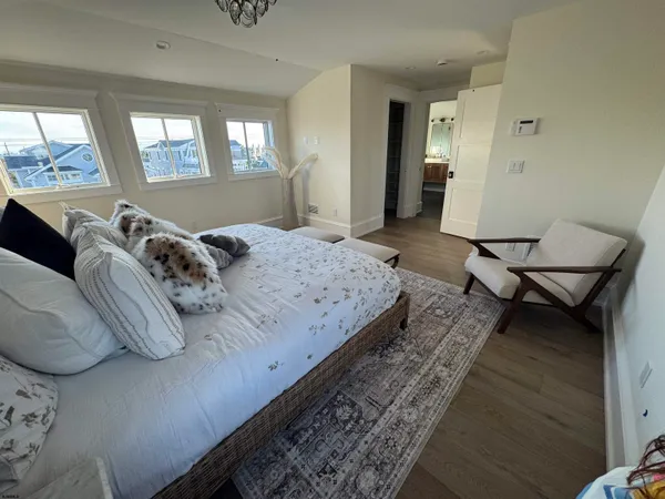 a bedroom with bed and window