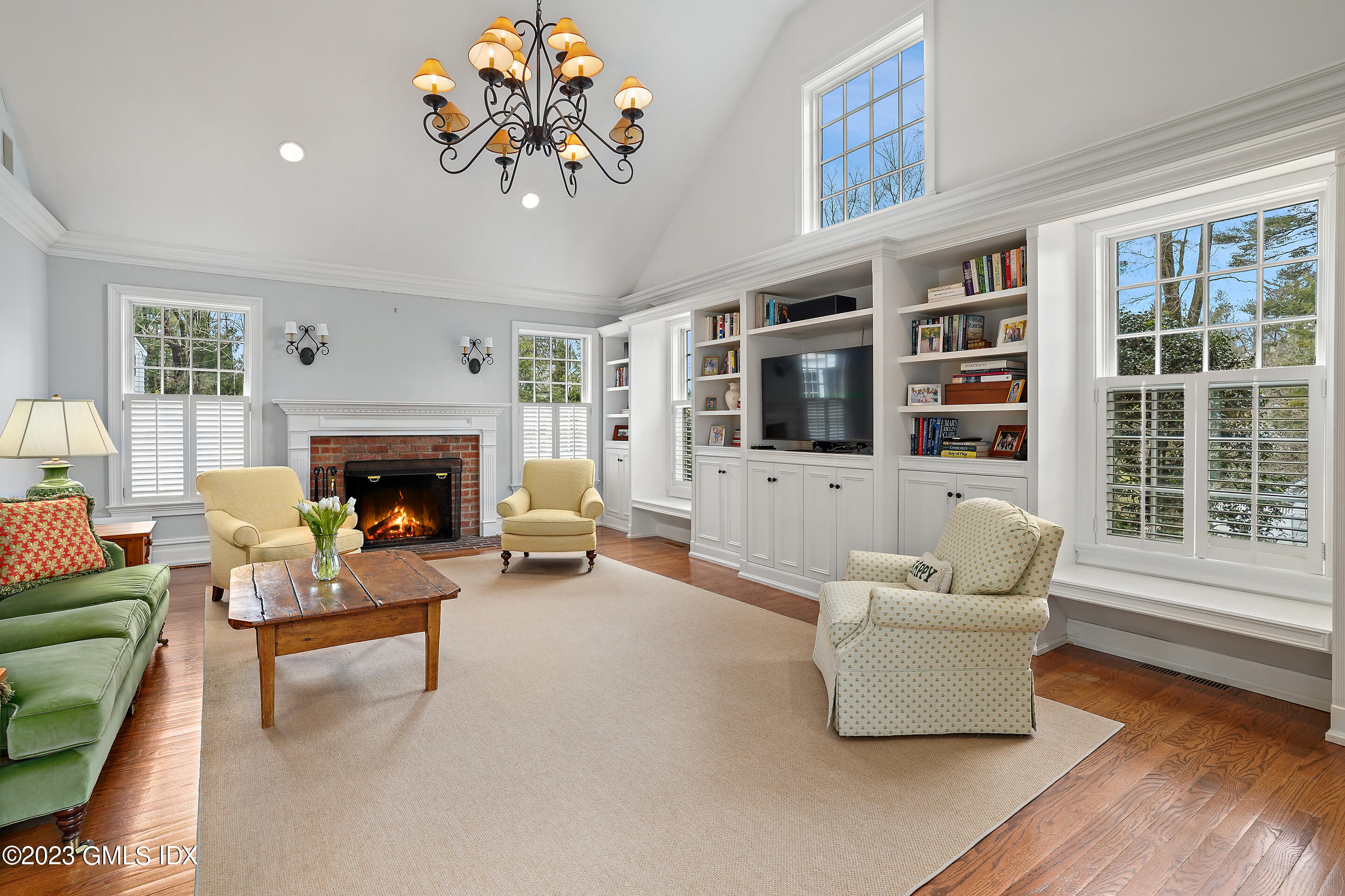 55 North Street Greenwich, CT 06830 - Photo 12 of 44 a living room with furniture and a fireplace