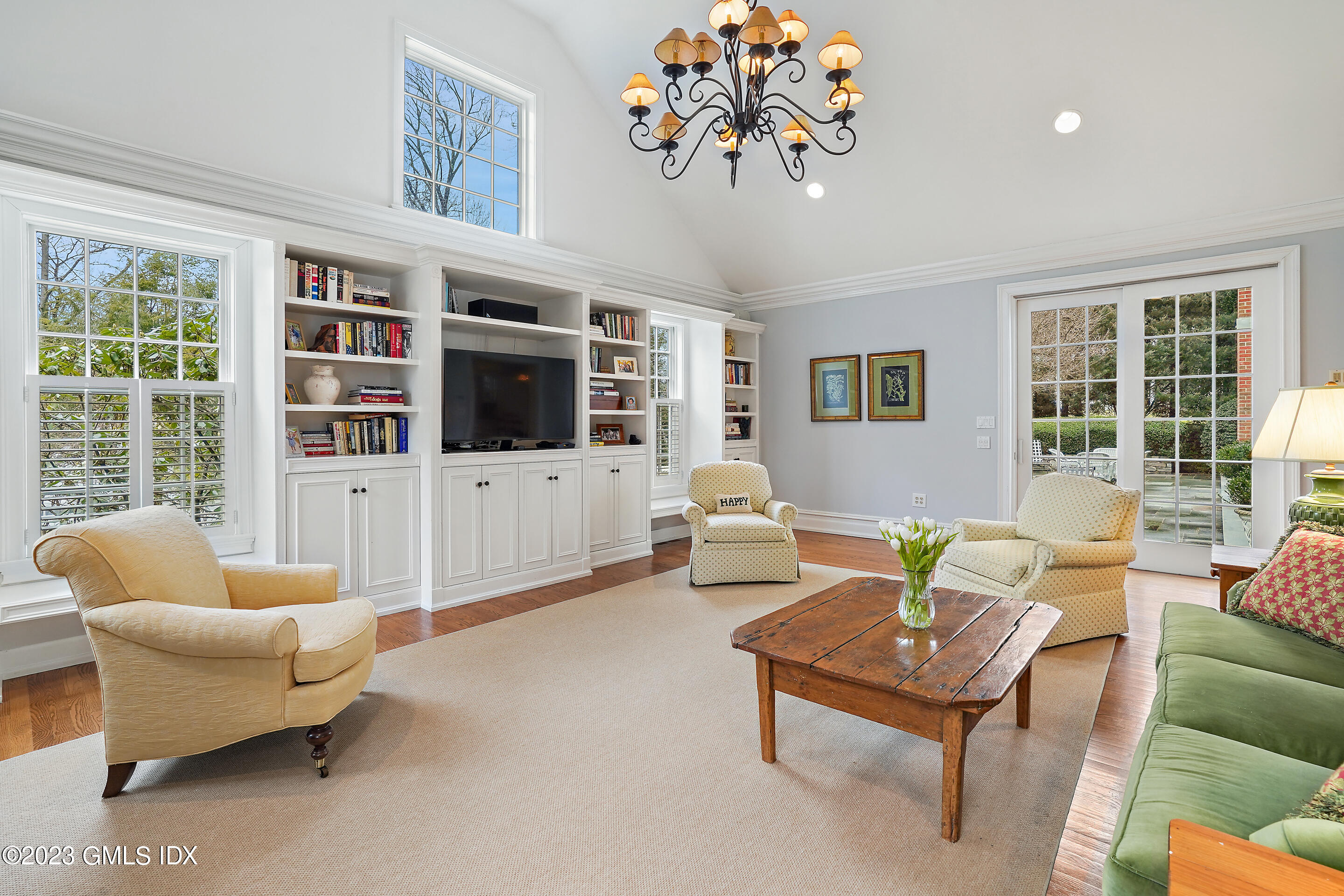 55 North Street Greenwich, CT 06830 - Photo 13 of 44 a living room with furniture and a large window