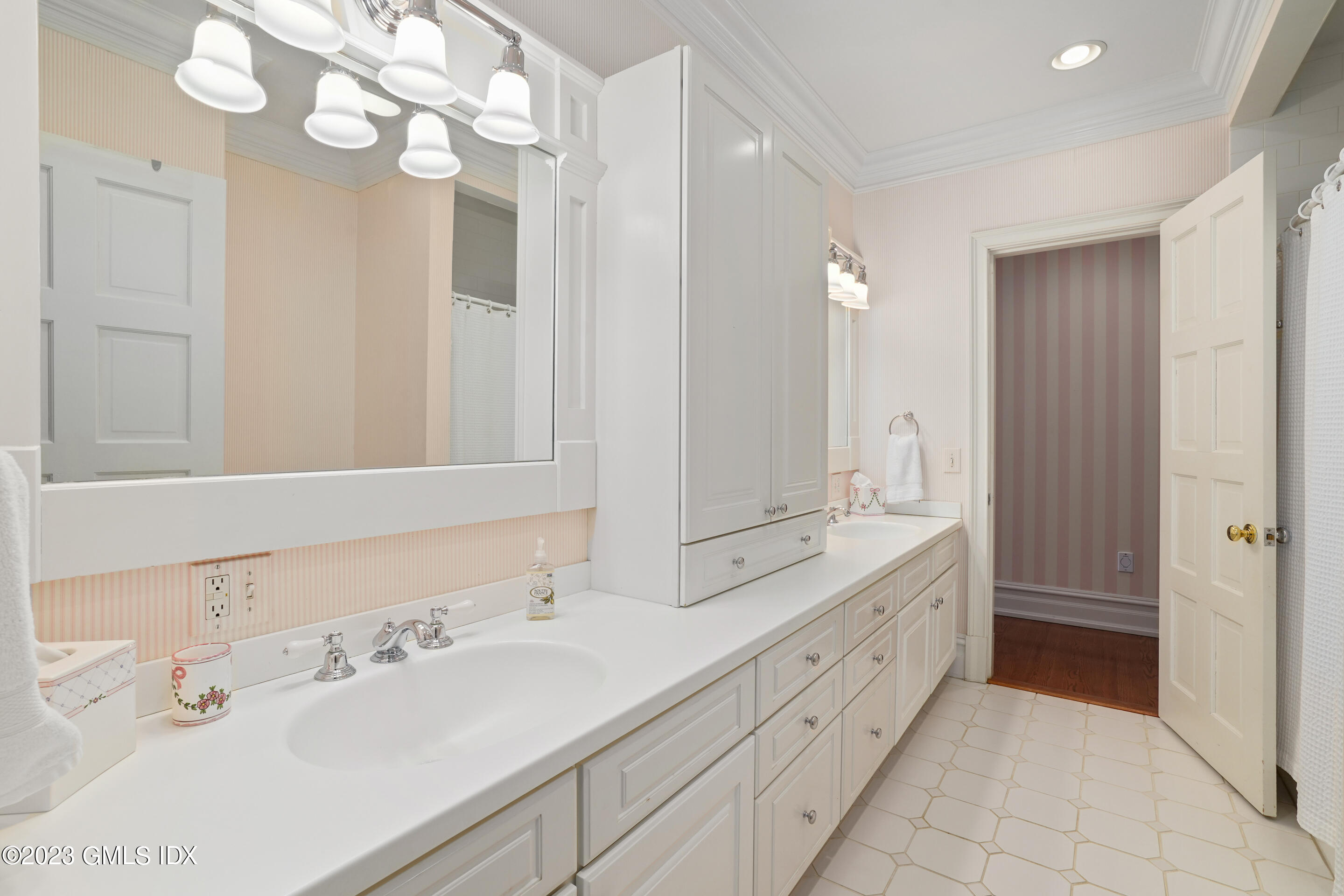 55 North Street Greenwich, CT 06830 - Photo 23 of 44 a bathroom with a double vanity sink mirror and double