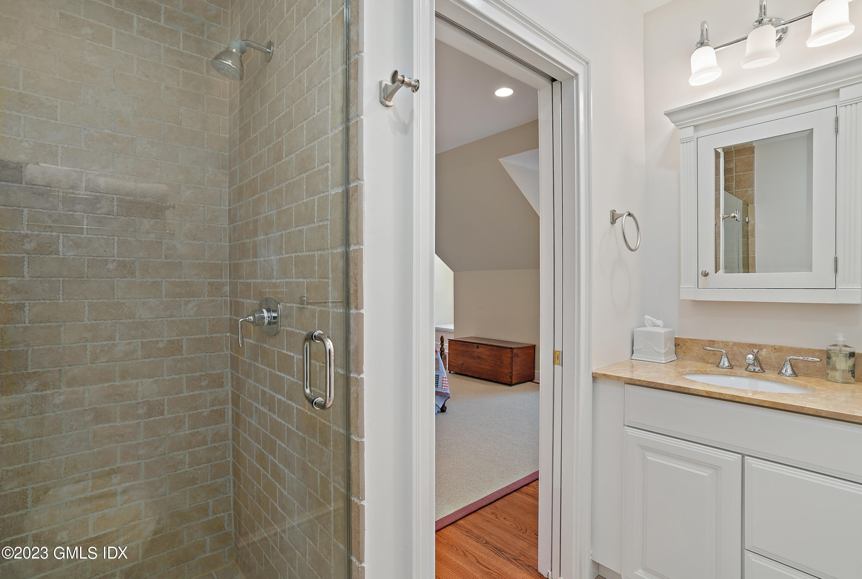 55 North Street Greenwich, CT 06830 - Photo 32 of 44 a bathroom with a sink and a mirror