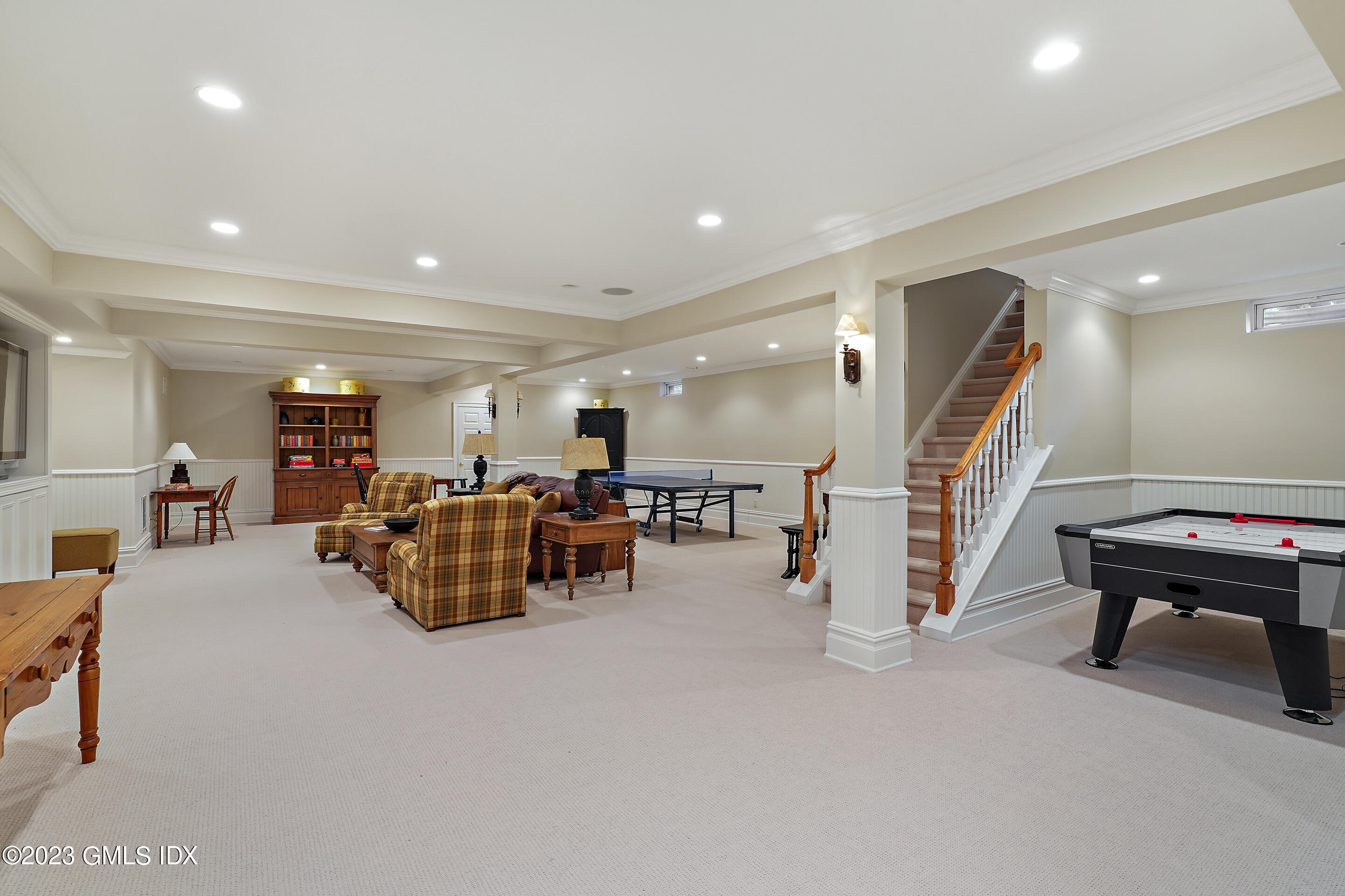 55 North Street Greenwich, CT 06830 - Photo 34 of 44 a living room with furniture and a table