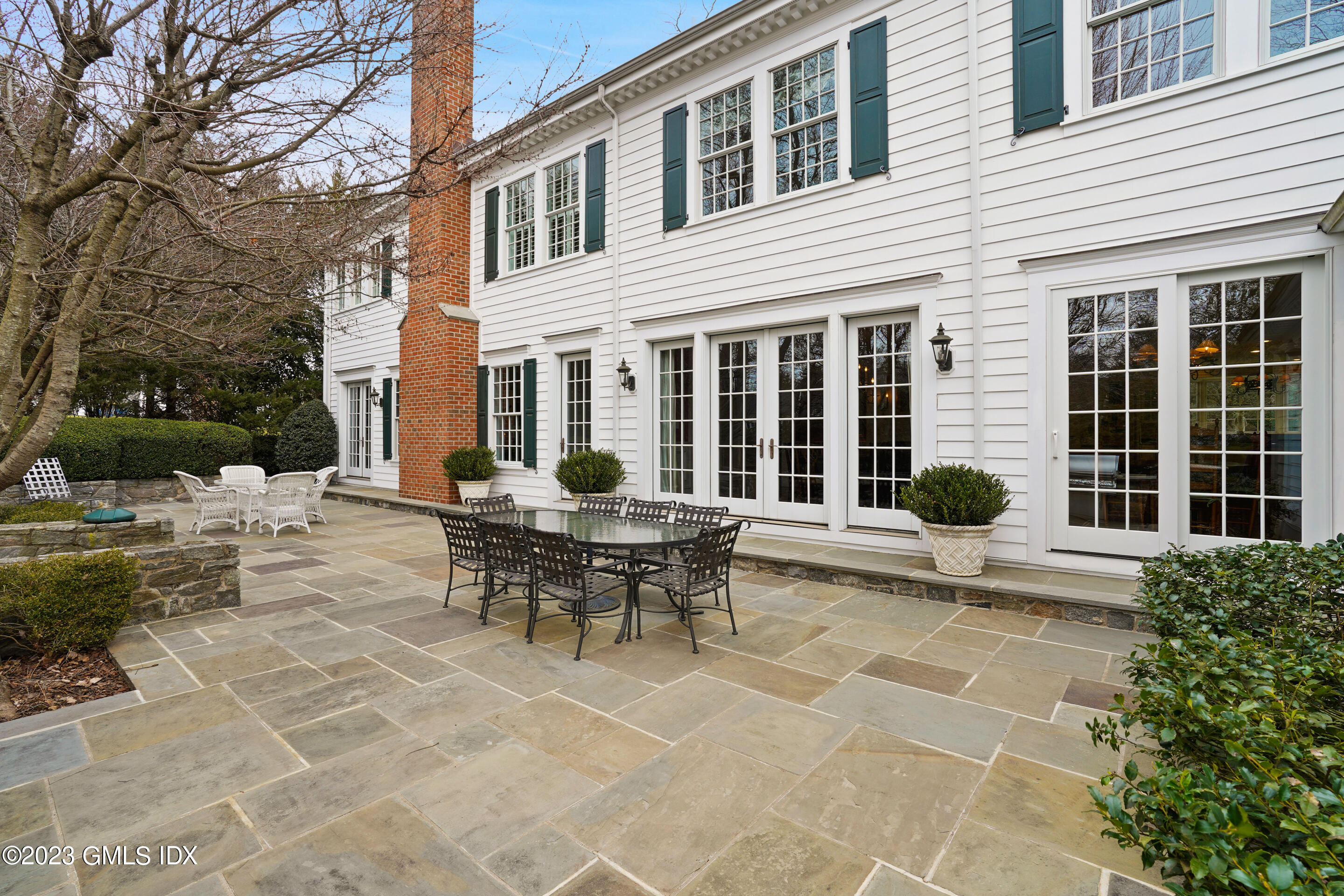 55 North Street Greenwich, CT 06830 - Photo 39 of 44 a view of a house with patio