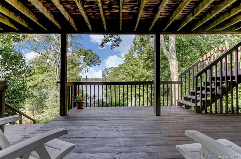 31001 Executive Point Tega Cay, SC 29708 - Photo 20 of 24 a view of porch with wooden floor in outdoor space