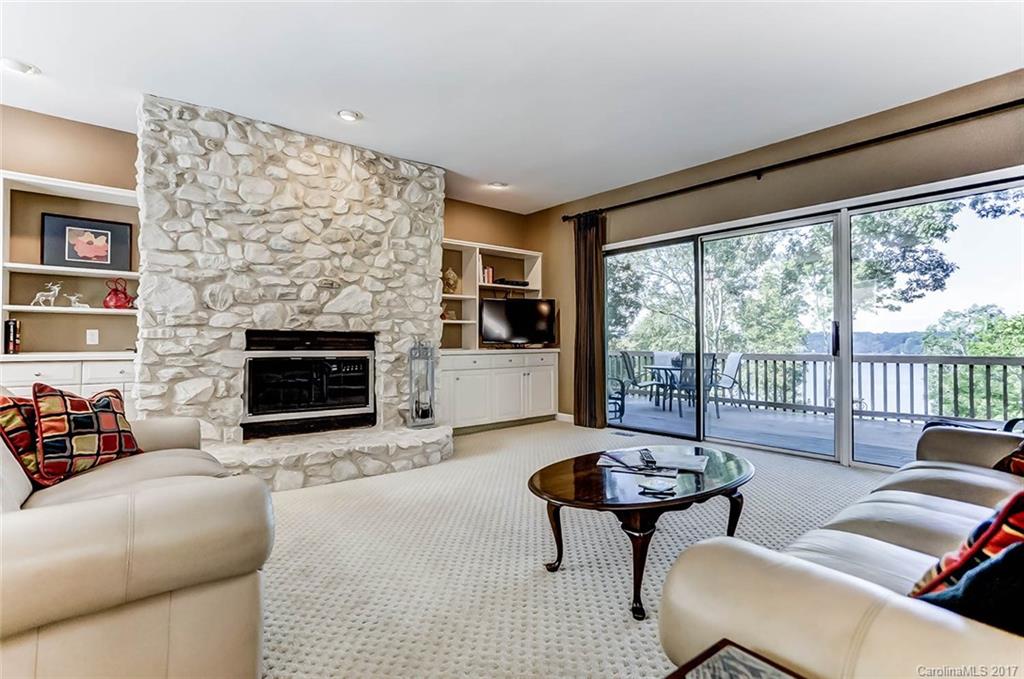 31001 Executive Point Tega Cay, SC 29708 - Photo 4 of 24 a living room with furniture and a fireplace