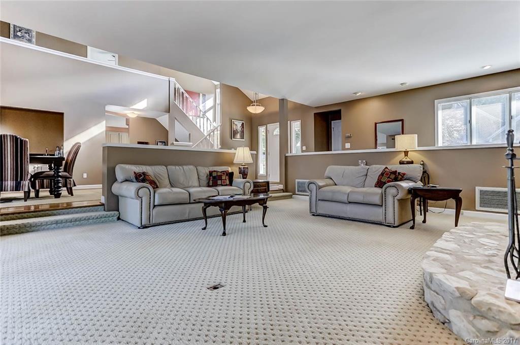 31001 Executive Point Tega Cay, SC 29708 - Photo 5 of 24 a living room with furniture and a couch