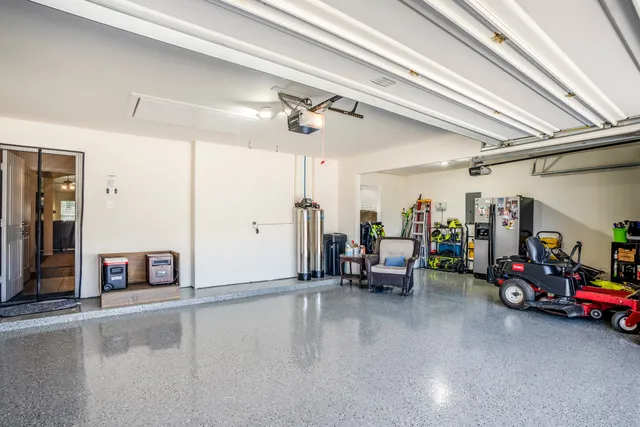 a view of a livingroom with furniture and a ceiling fan