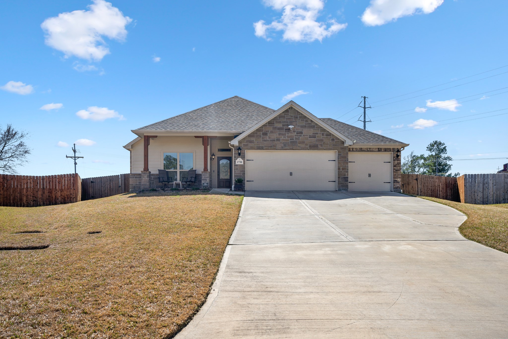 1730 Wandering Hills Road Conroe, TX 77304 - Photo 45 of 45 a view of a house with a outdoor space