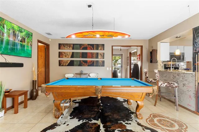 a room with table and chairs