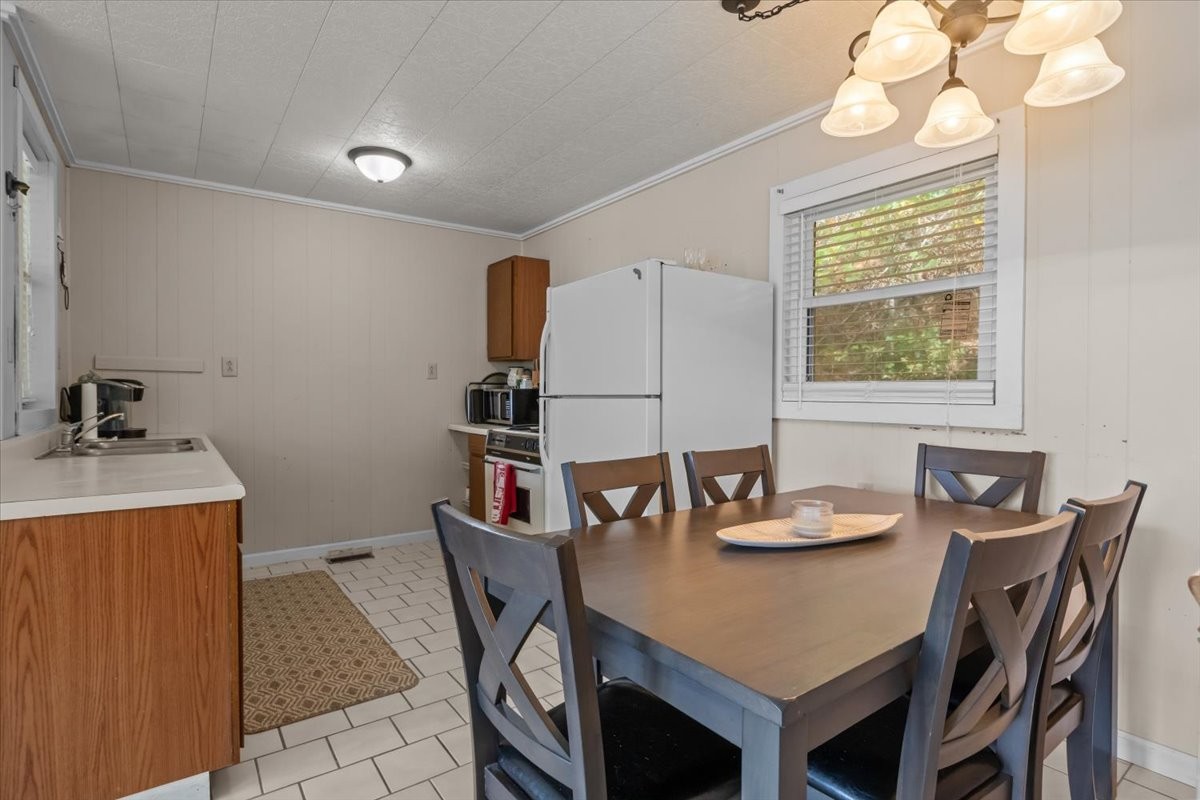 38 Lakeland Road Waverly, TN 37185 - Photo 11 of 41 a dining room with furniture and window