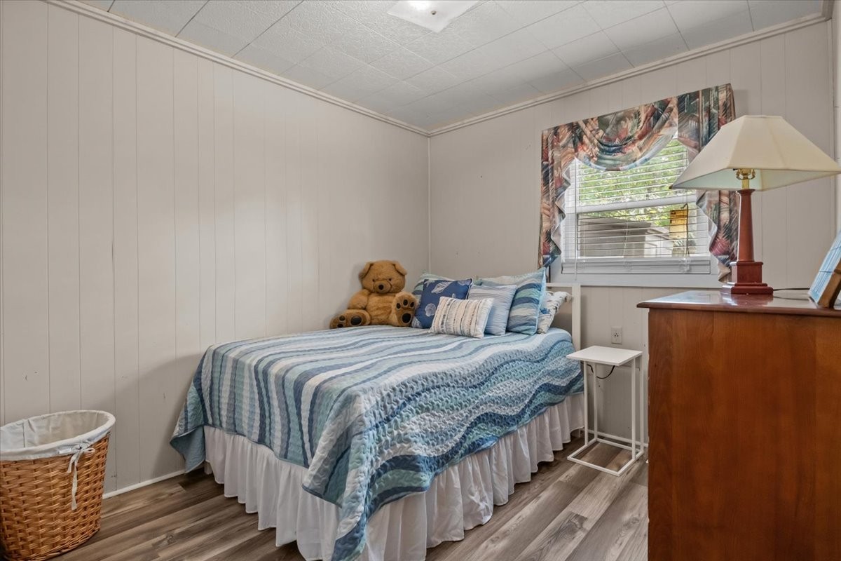 38 Lakeland Road Waverly, TN 37185 - Photo 15 of 41 a bedroom with a bed and a window