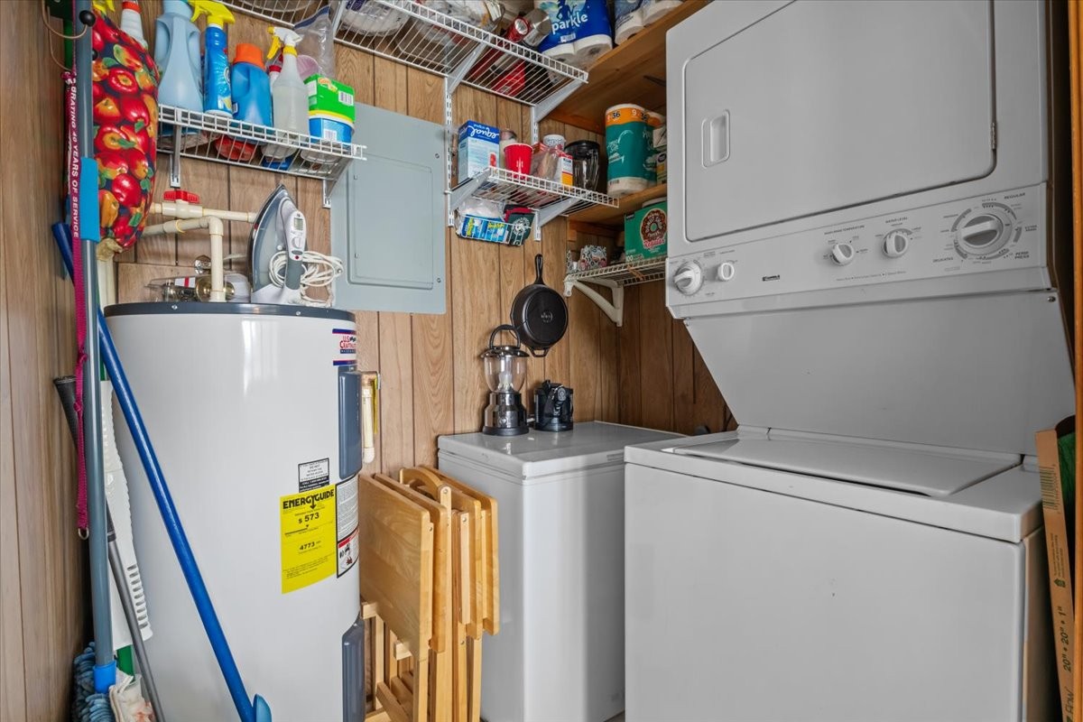 38 Lakeland Road Waverly, TN 37185 - Photo 19 of 41 a view of storage and utility room with washer and dryer