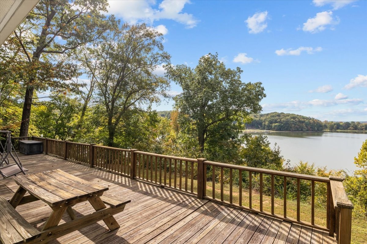 38 Lakeland Road Waverly, TN 37185 - Photo 21 of 41 a view of balcony with wooden floor and lake view