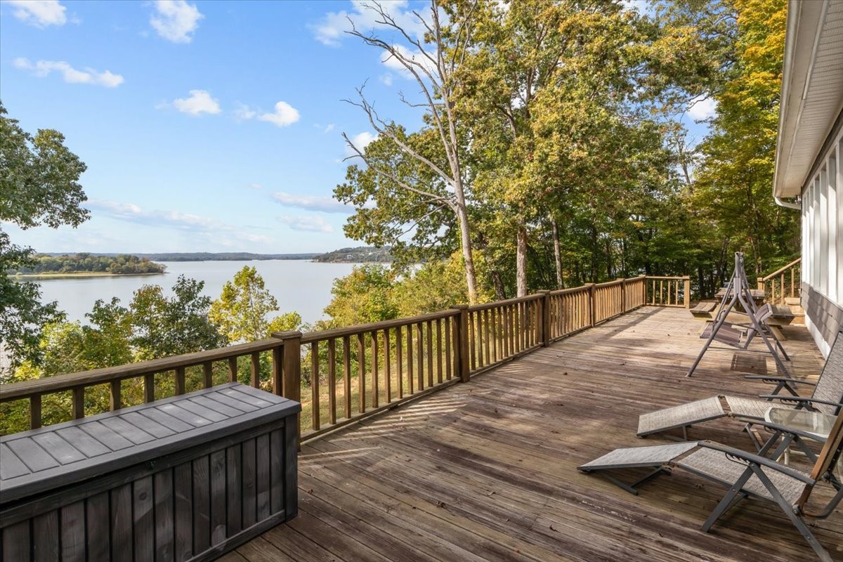 38 Lakeland Road Waverly, TN 37185 - Photo 22 of 41 a view of a balcony with wooden floor and fence
