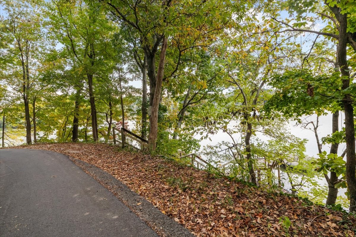 38 Lakeland Road Waverly, TN 37185 - Photo 25 of 41 a backyard of a house with lots of green space
