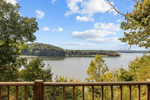 a view of a lake from a balcony