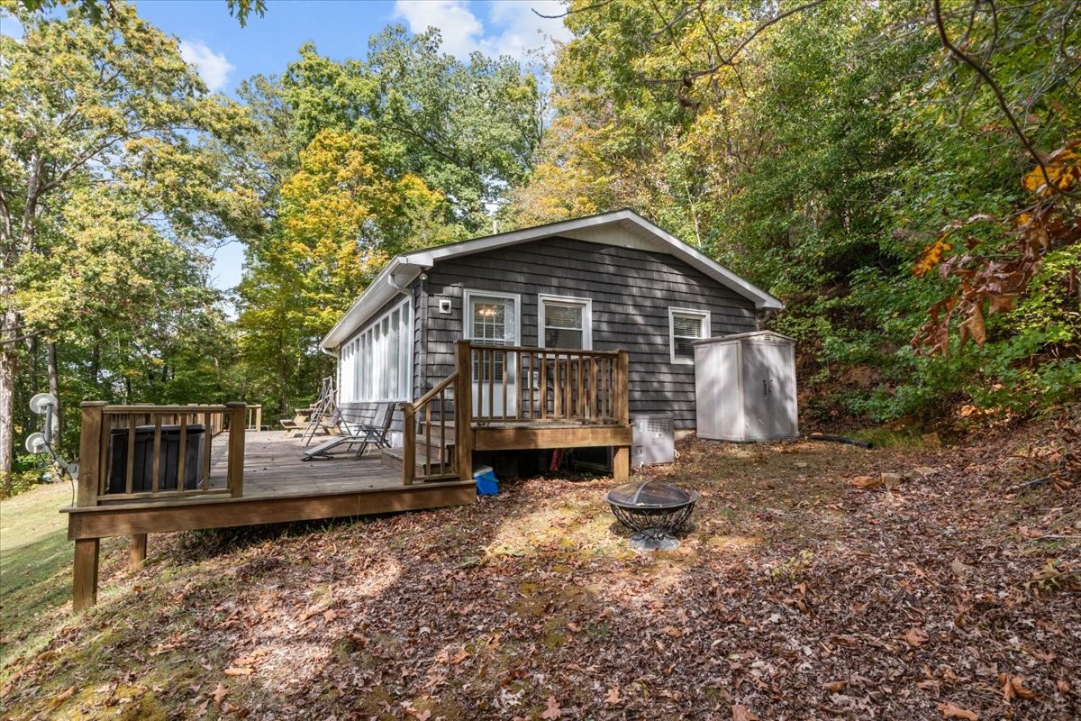 38 Lakeland Road Waverly, TN 37185 - Photo 32 of 41 a view of a house with a yard