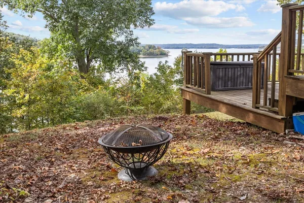 a view of a backyard with a fountain