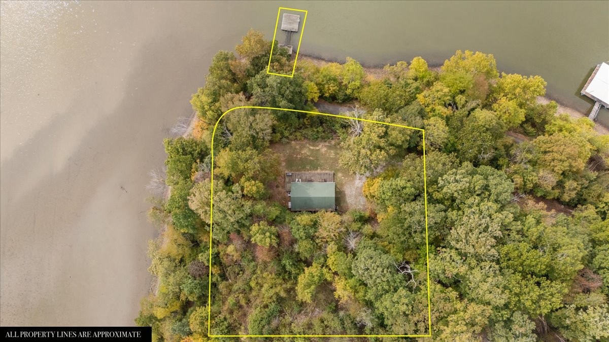 38 Lakeland Road Waverly, TN 37185 - Photo 40 of 41 a bathroom with a sink and a mirror