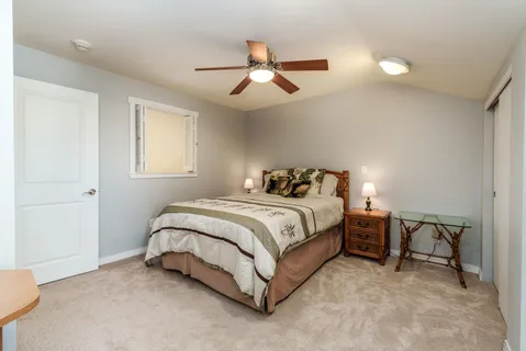 a kitchen with granite countertop a sink and cabinets