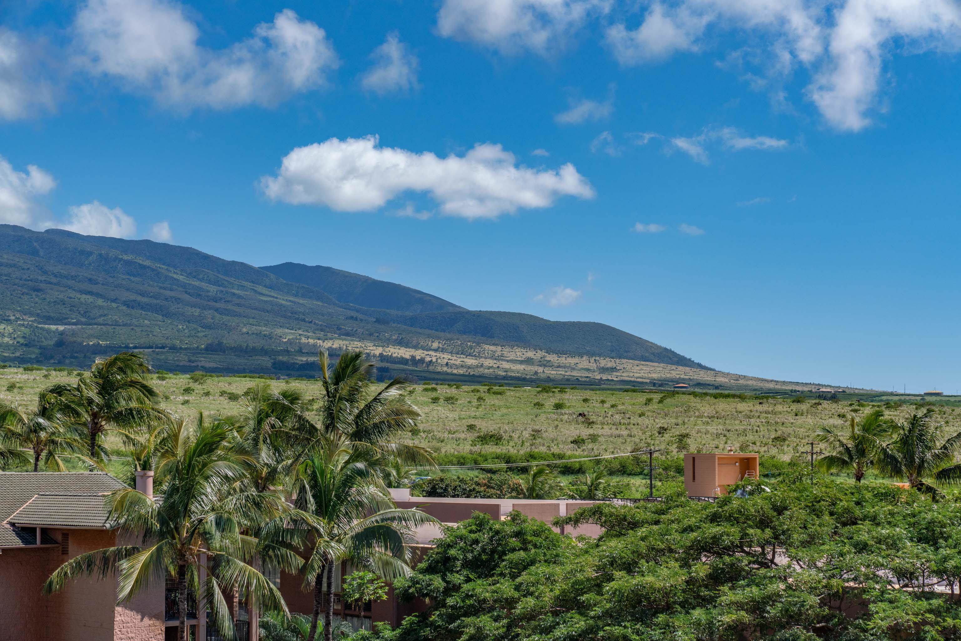 3708 Lower Honoapiilani Road, Unit E43 Lahaina, HI 96761 - Photo 31 of 40 a view of a lake with a mountain in the background