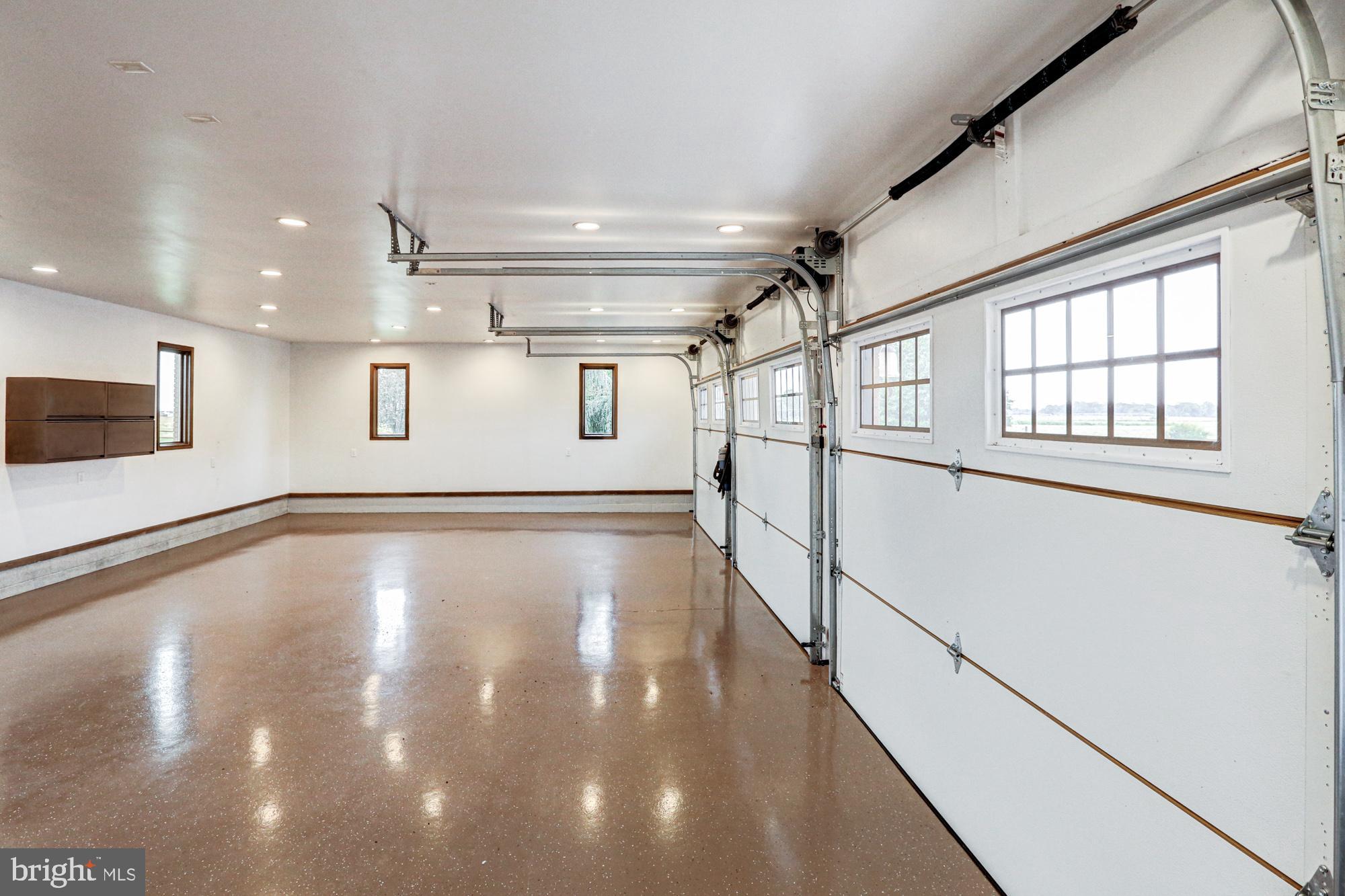 550 Green Giant Road Townsend, DE 19734 - Photo 104 of 145 a view of an empty room with wooden floor and a window