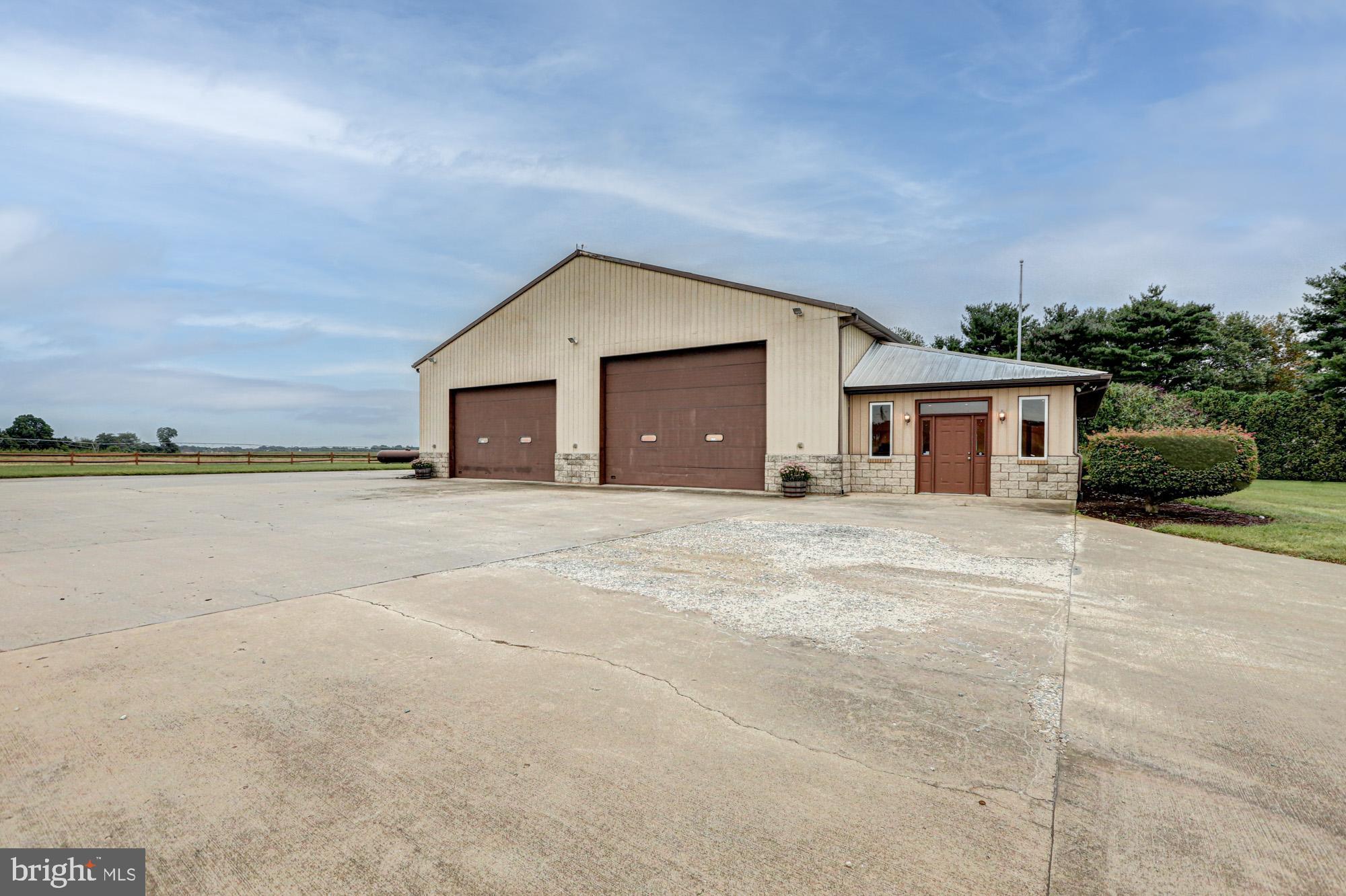 550 Green Giant Road Townsend, DE 19734 - Photo 123 of 145 a view of a house with a yard and potted plants
