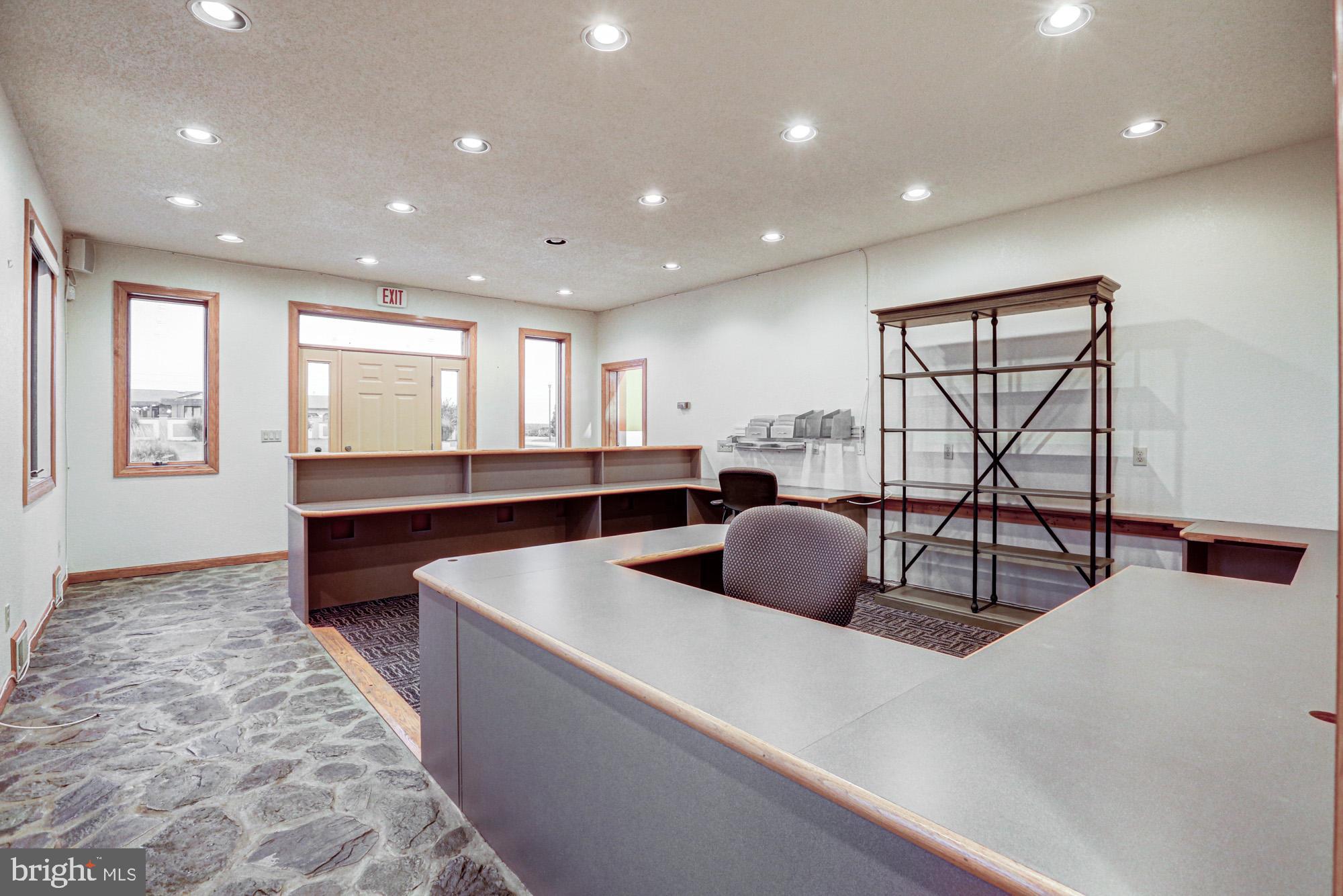 550 Green Giant Road Townsend, DE 19734 - Photo 137 of 145 a large kitchen with stainless steel appliances a large counter top a stove and a window