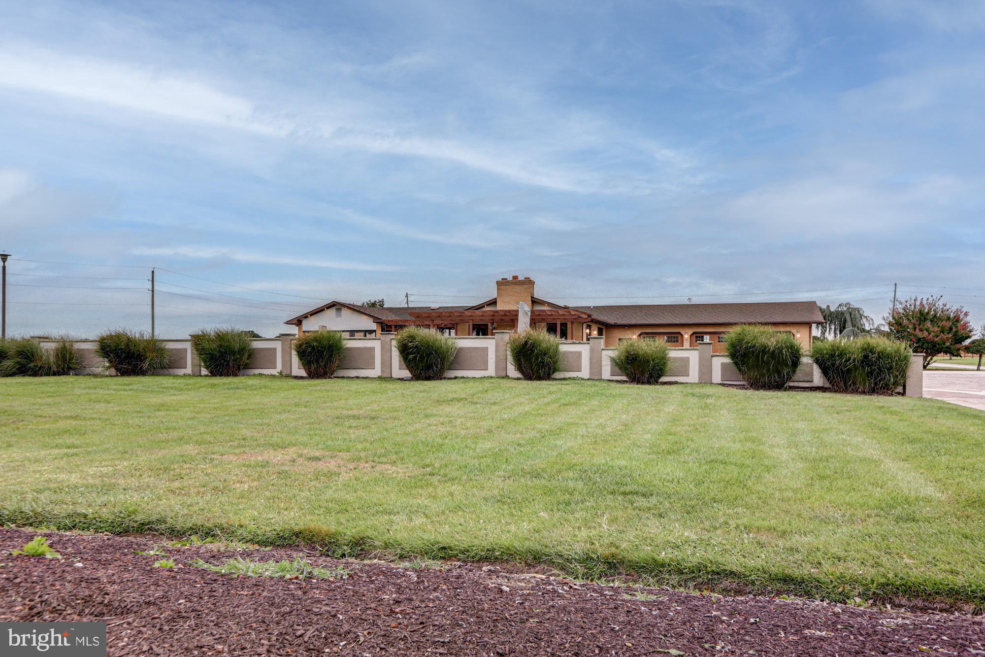 550 Green Giant Road Townsend, DE 19734 - Photo 40 of 145 a front view of a house with a yard