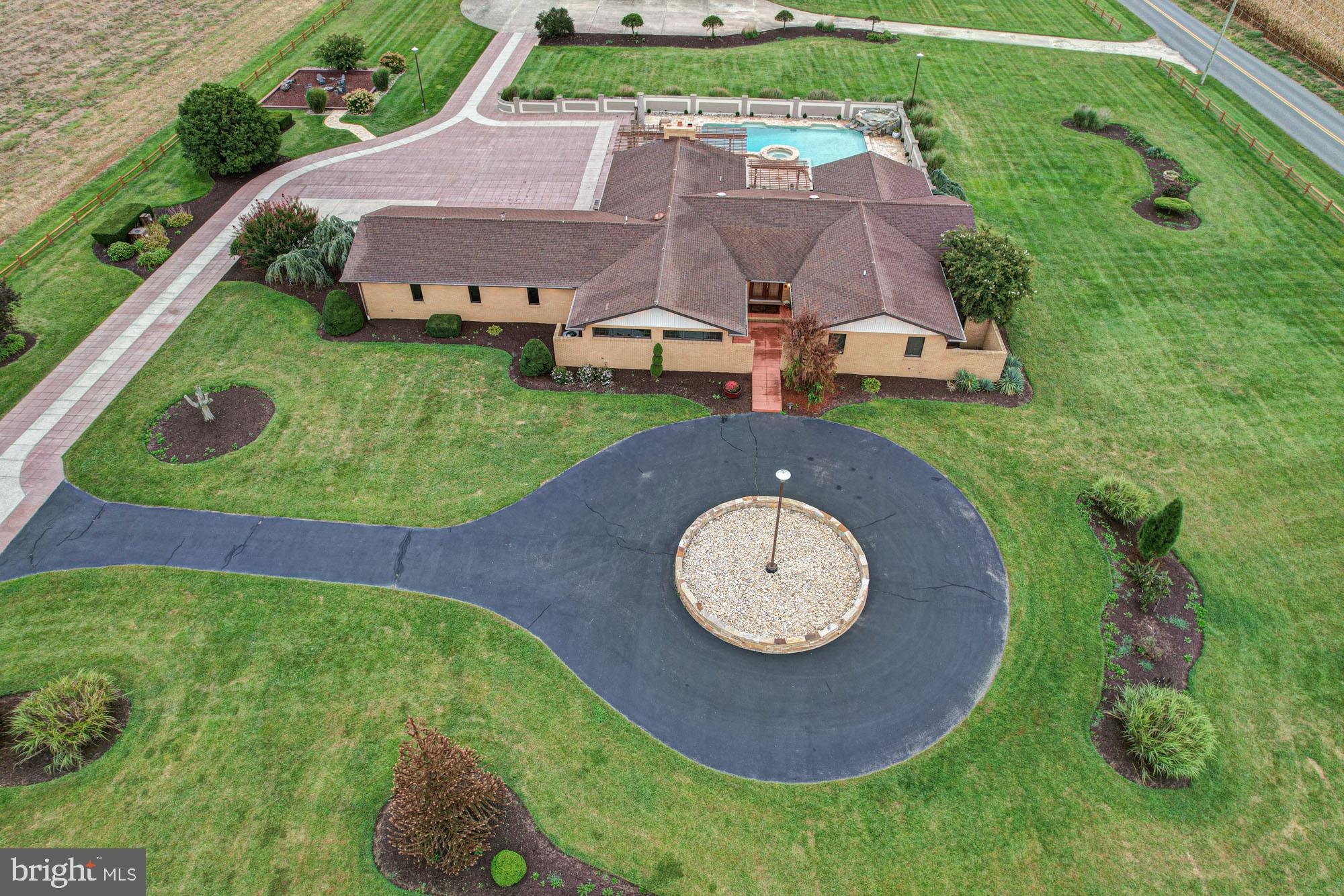550 Green Giant Road Townsend, DE 19734 - Photo 5 of 145 an aerial view of a house with a garden and trees