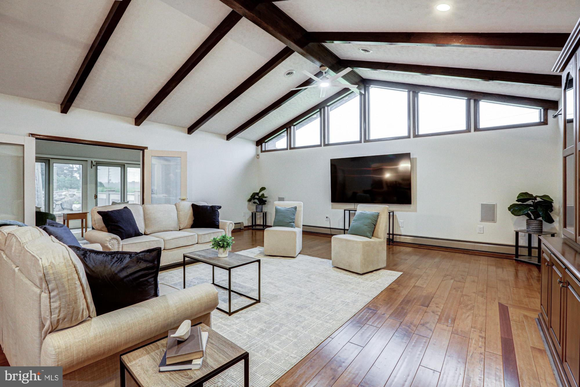 550 Green Giant Road Townsend, DE 19734 - Photo 60 of 145 a living room with furniture and a flat screen tv