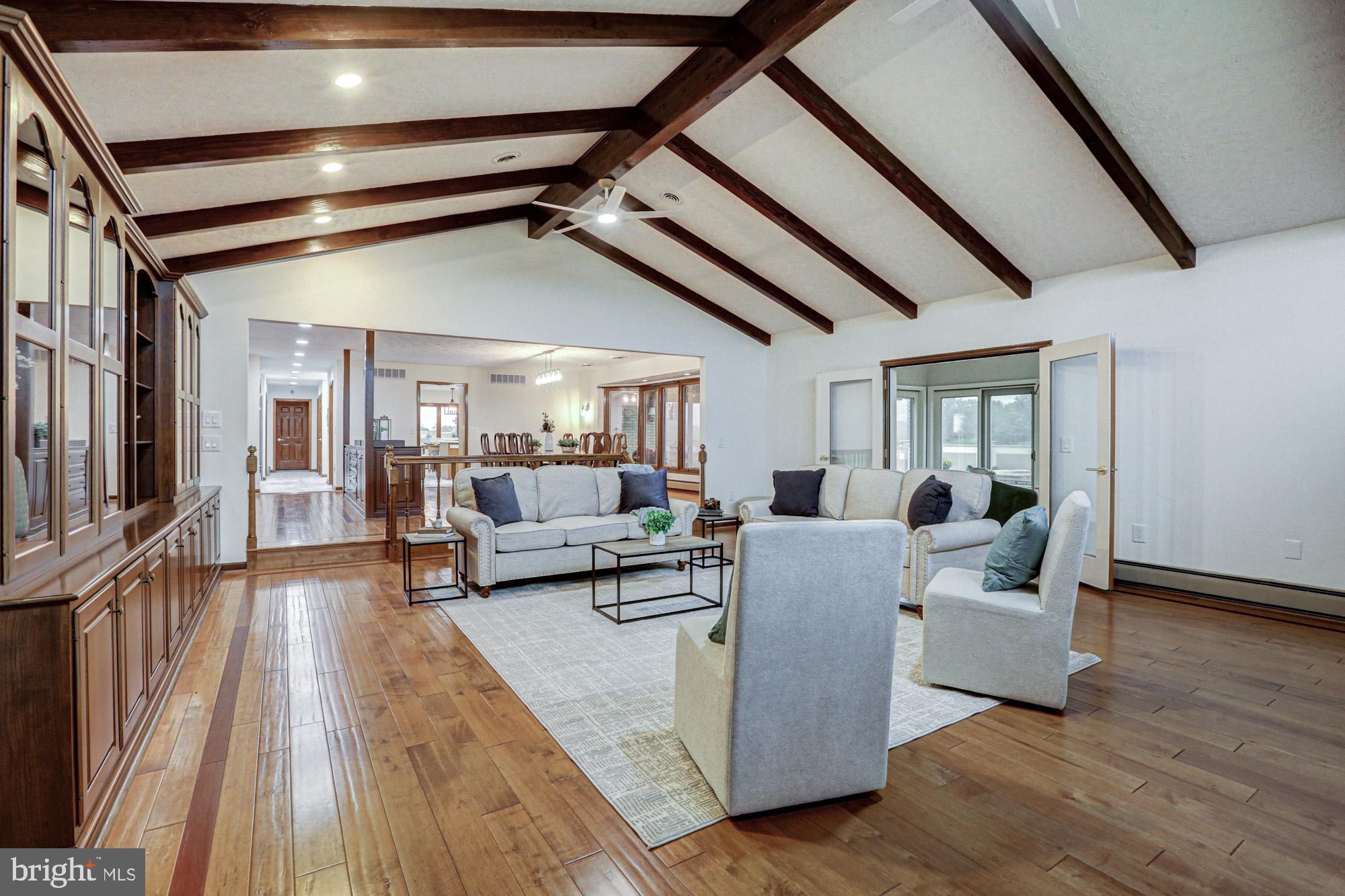 550 Green Giant Road Townsend, DE 19734 - Photo 61 of 145 a living room with furniture and a wooden floor