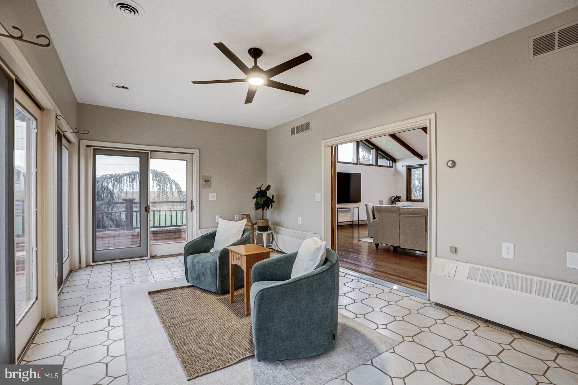 550 Green Giant Road Townsend, DE 19734 - Photo 65 of 145 a living room with furniture and a large window