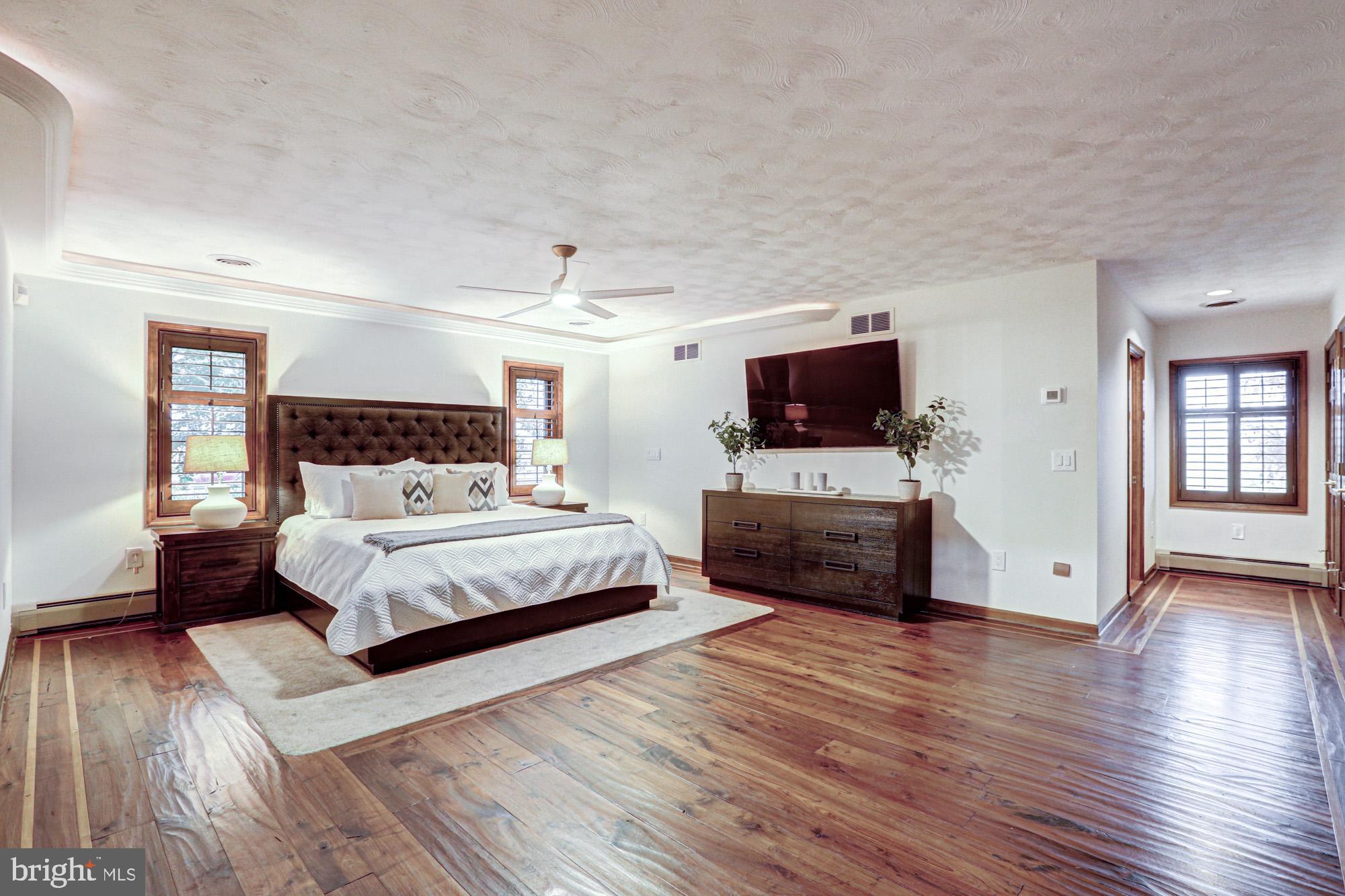 550 Green Giant Road Townsend, DE 19734 - Photo 66 of 145 a bedroom with a bed and a television