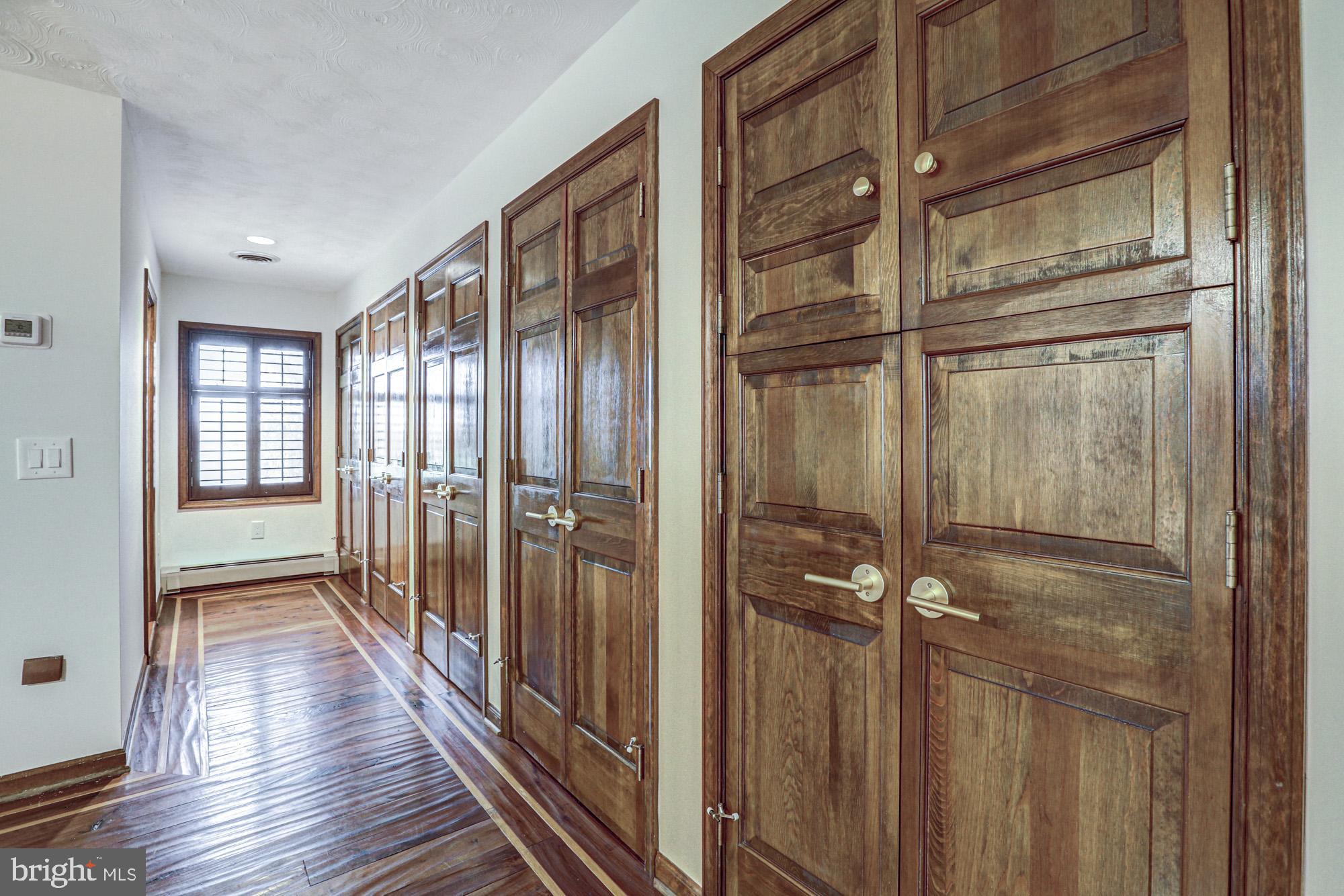 550 Green Giant Road Townsend, DE 19734 - Photo 70 of 145 a view of a hallway with wooden floor and staircase
